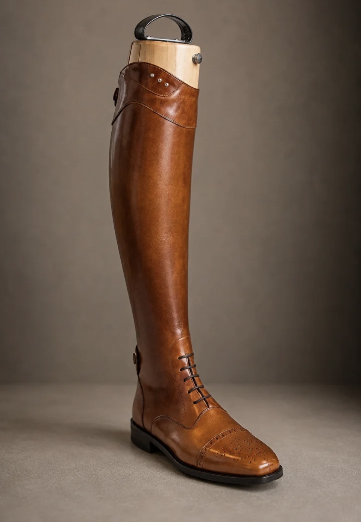 Cognac bespoke boot on a wooden last with laced brogue front