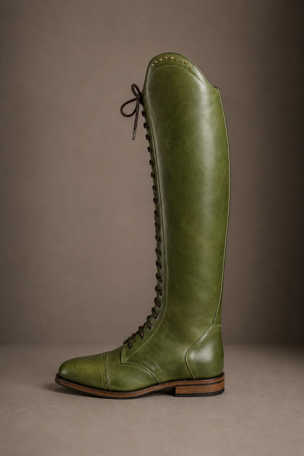 Bespoke laced riding boot in olive green leather with brogue toe cap